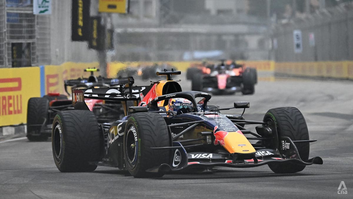 Motor racing-Verstappen wins Singapore sprint after chaotic start in wet conditions