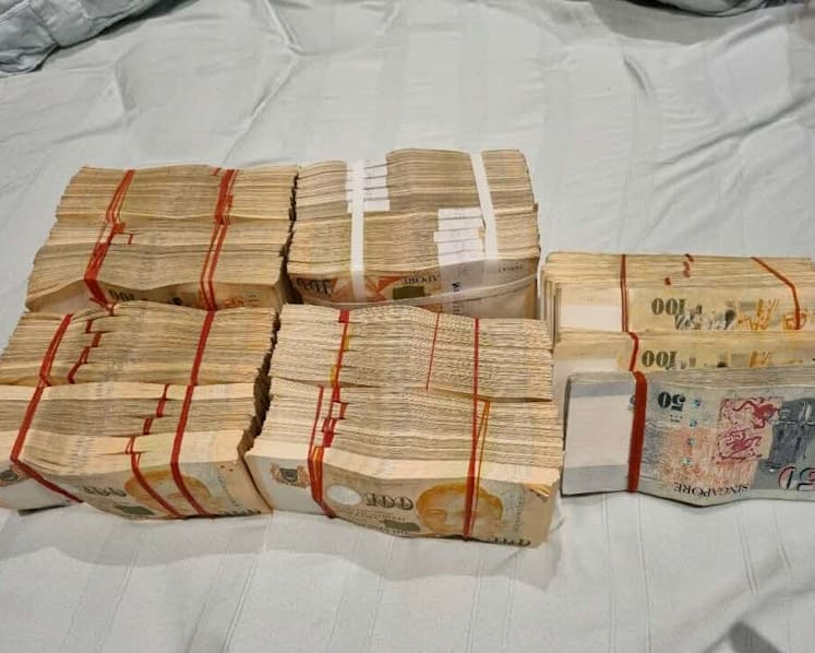 Seven men charged over links to global syndicate that conducts 'malicious cyber activities'