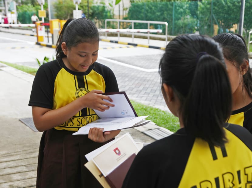 Lailatul Huda Abdul Razak with her ex-classmates after getting their PSLE results