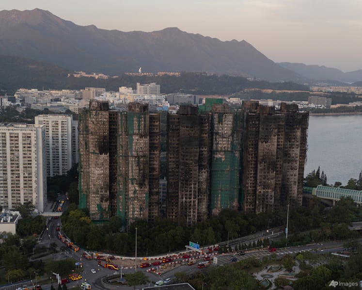 Hong Kong police arrest man for posts about deadly fire