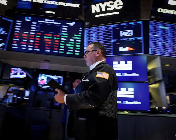 Dow, S&P 500 hit record highs as Santa rally begins