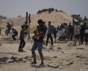 Gaza civil defence says 34 killed by Israeli fire
