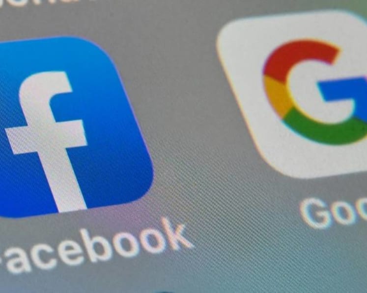 Australia says Google, Facebook close to media pay deals