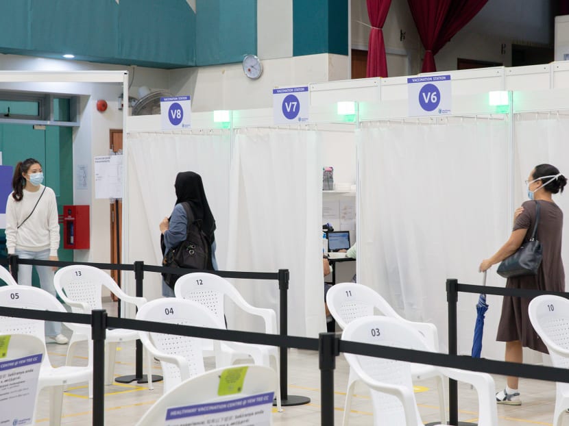 People walking to the observation station after getting their Covid-19 vaccine at Yew Tee Community Centre on April 21, 2021. People walking to the observation station after getting their Covid-19 vaccine at Yew Tee Community Centre on April 21, 2021.