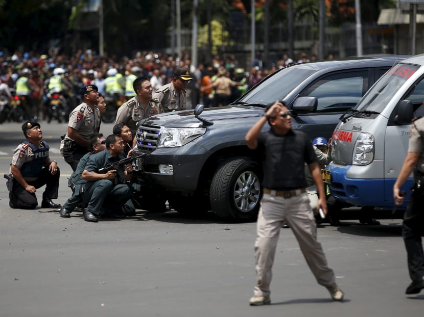 Seven dead in Jakarta blasts, gunfight