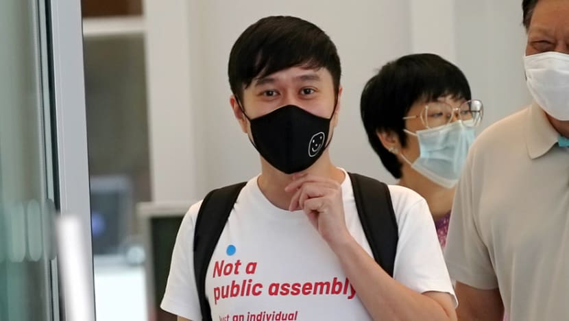 Jolovan Wham convicted of unlawful assembly for holding sign outside former State Courts building