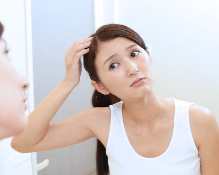 Why is my scalp suddenly so oily despite washing my hair regularly? Here's how to fix it