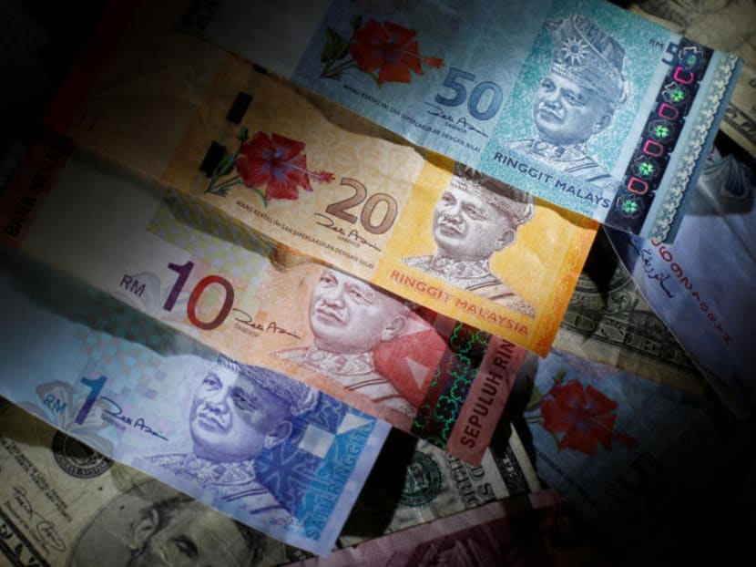 Singdollar loses ground against ringgit after hitting 17-month high