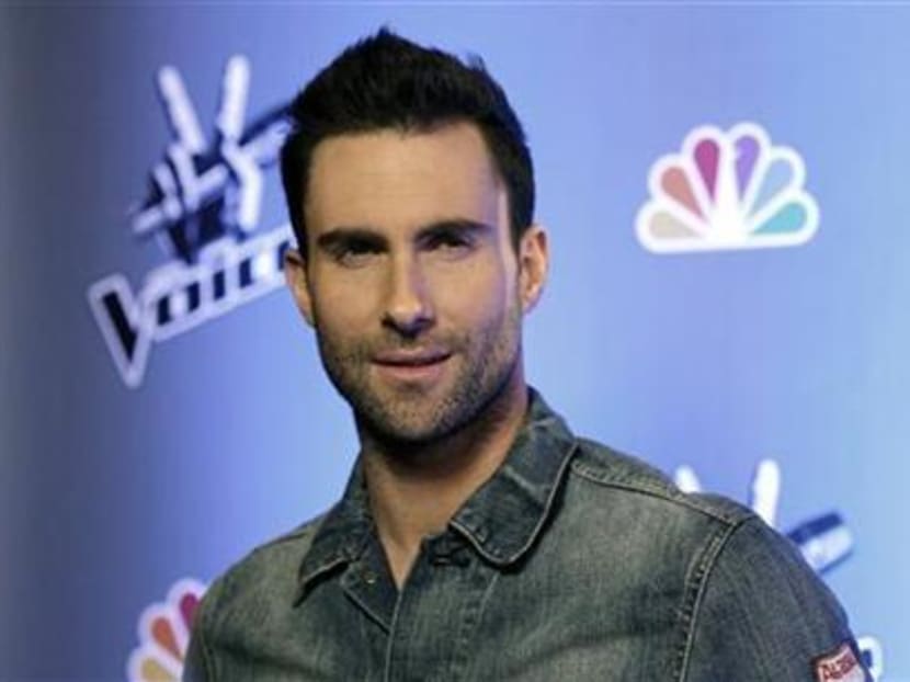 Singer Adam Levine poses during a media event for the upcoming television series ''The Voice'' in Los Angeles on March 15, 2011. Photo: Reuters