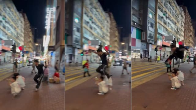 从蹲地孩童头顶上跳过 两港男“街头特技”引热议