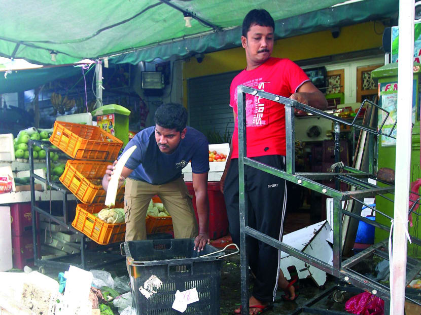 Residents, shops pick up the pieces after riot