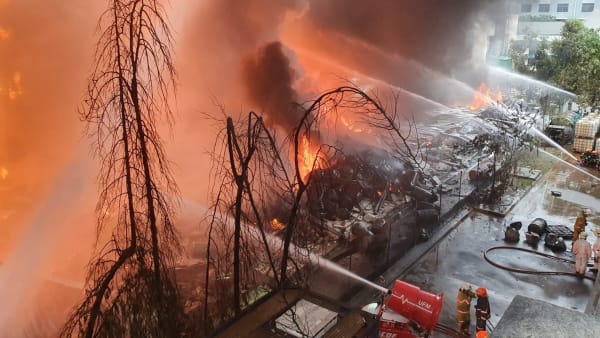 130 firefighters brave intense heat, explosions, to put out fire