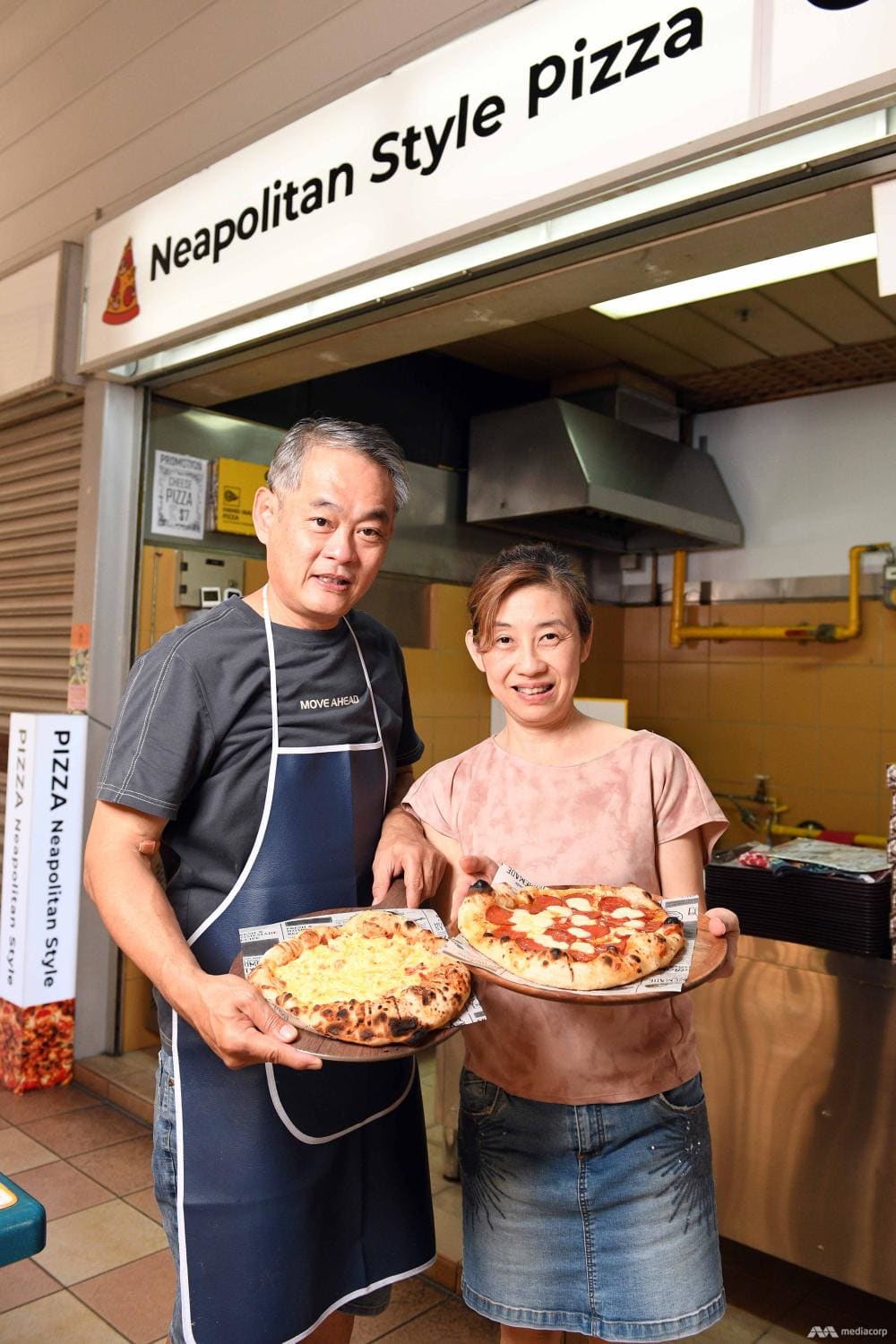 Couple opens pizza hawker stall so their special needs child has a