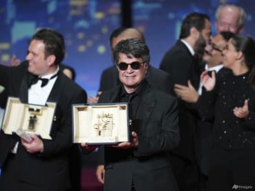 Iranian filmmaker Panahi wins top prize at Cannes