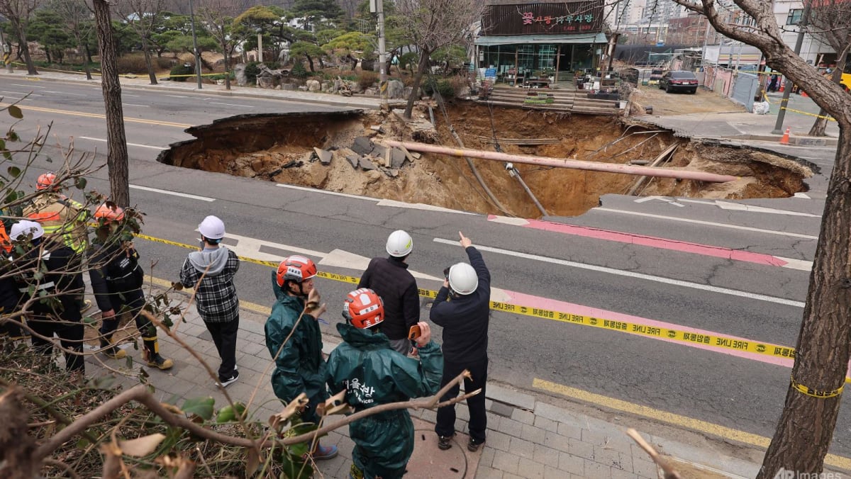 Motorcyclist who disappeared into huge Seoul sinkhole found dead