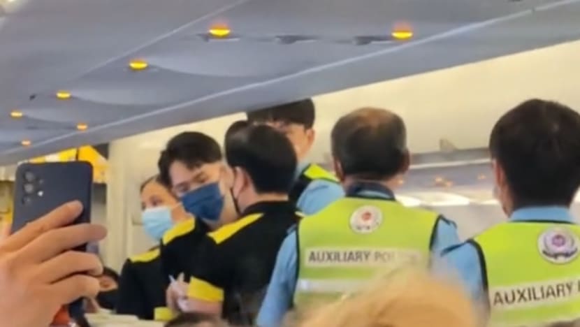 Bali-Singapore flight landing delayed after passengers refused to fasten seatbelts, says Scoot