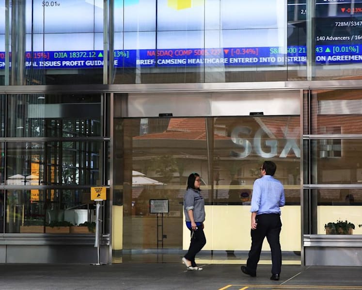 Investors urged to stay on the sidelines, as STI sees largest single-day drop in over 10 years