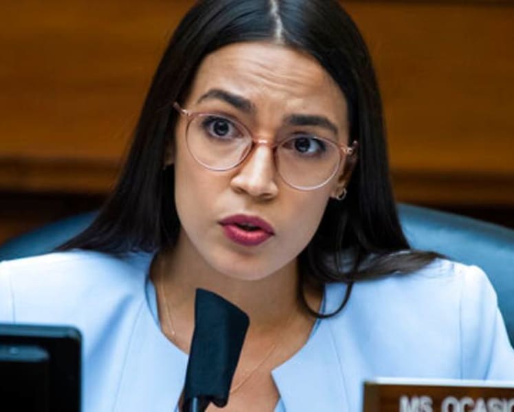 Ocasio-Cortez leads lawmakers recalling Capitol siege