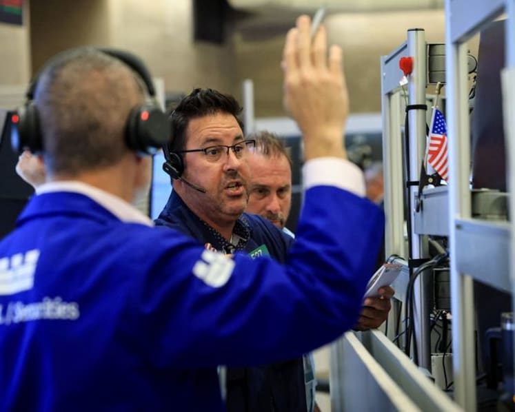 Stocks sink on Big Tech cash burn; oil hits $100 for first time since May