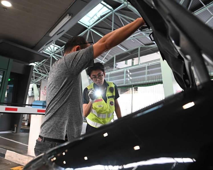 More officers redeployed to help with security checks amid heightened measures at Singapore checkpoints