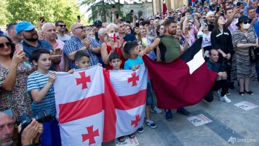 Protests erupt in Georgia after beaten journalist dies