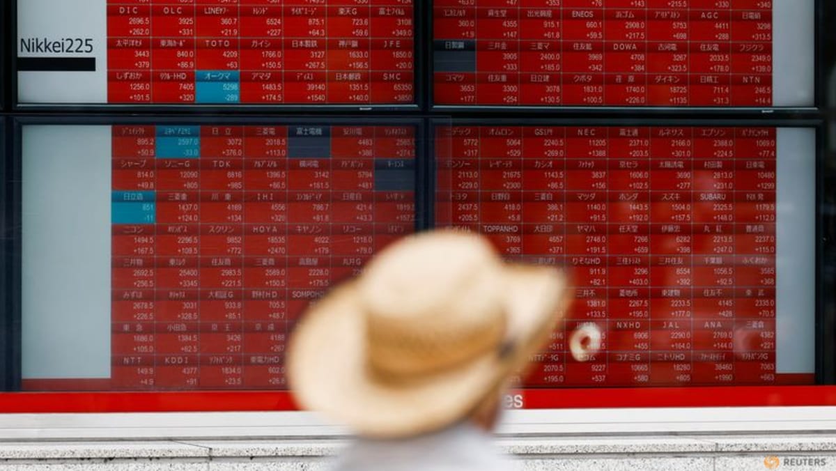 Asian shares rise, dollar strengthens ahead of US earnings; JGB yields surge