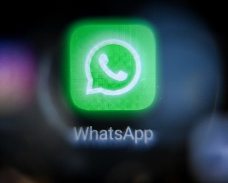 22 men charged with obstructing justice by alerting WhatsApp groups about raids 