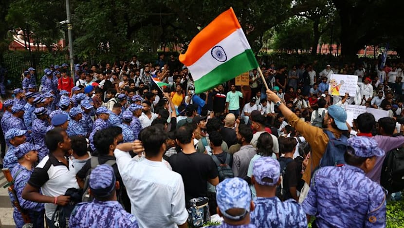 Indian police fire tear gas at exam protest march