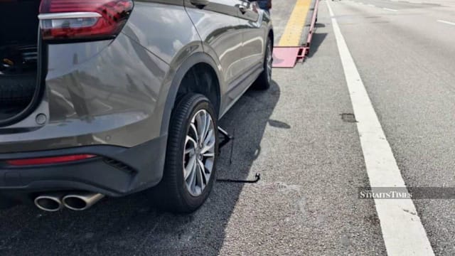 南北大道路肩换轮胎遭罗厘撞击 马国女子当场身亡