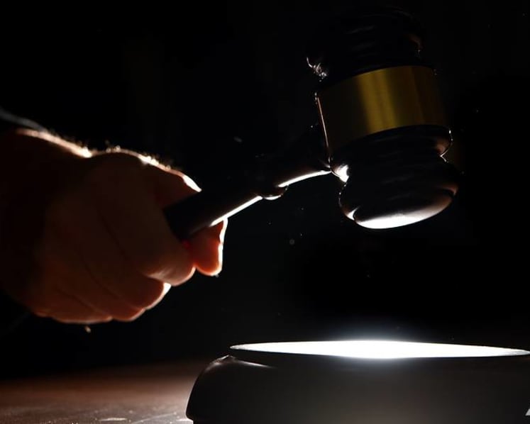 Company director jailed for withholding salaries of foreign workers, making them pay for work pass renewals