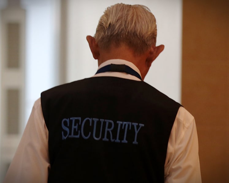 2 firms charged with allowing multiple security officers to work for more than 12 hours