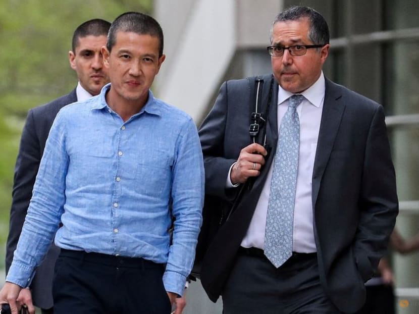 Ex-Goldman Sachs banker Roger Ng and his lawyer Marc Agnifilo leave the federal court in New York, US, on May 6, 2019.