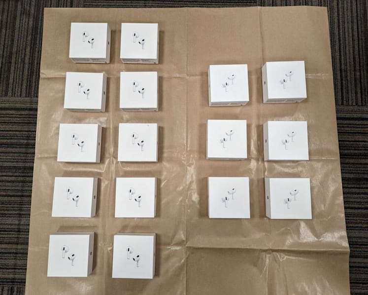 Two men charged for running online scams involving fake AirPods 