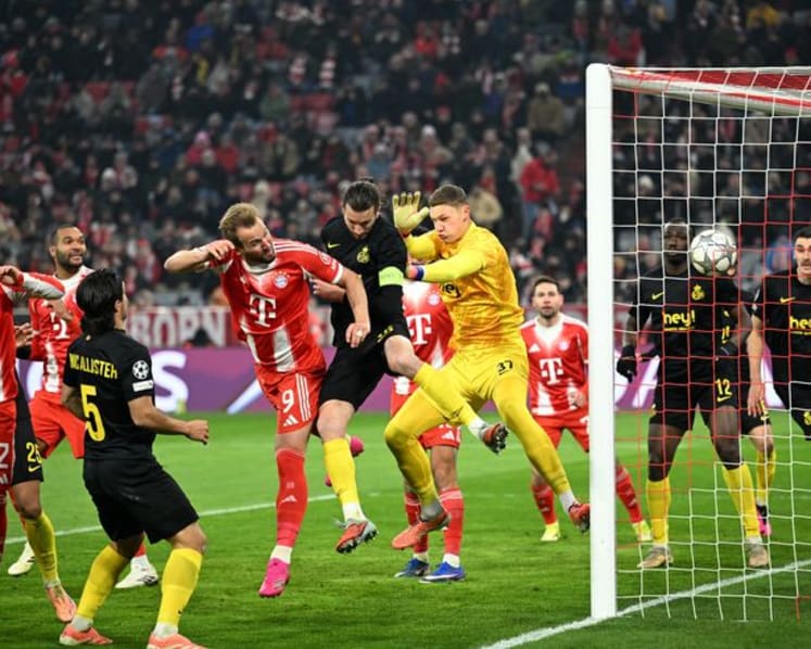 Kane double carries 10-man Bayern past Union Saint-Gilloise and into knockout stage