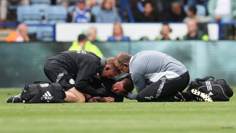 Referee Webb substituted due to head injury on Premier League debut