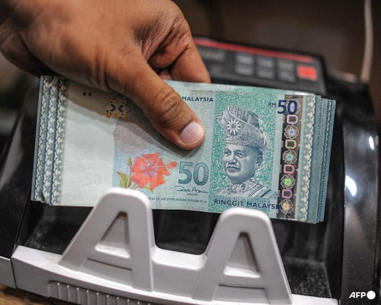 Ringgit hits 7-year high against US dollar; Anwar says rally shows confidence in Malaysia
