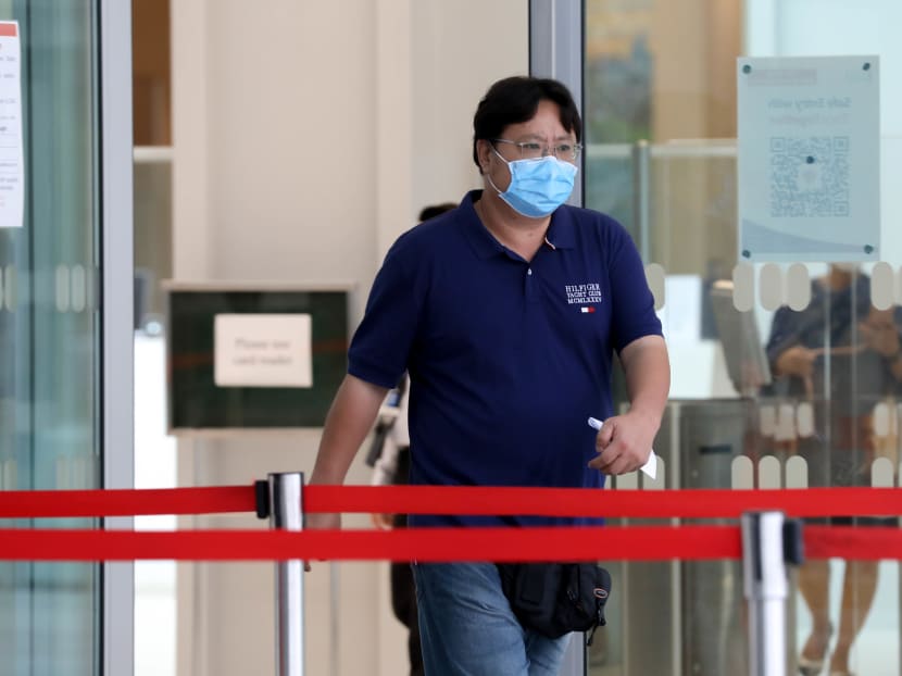 Gwee Kim Han, 48, is seen leaving State Courts on May 5, 2021.
