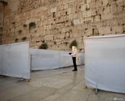Israel allows up to 100 worshippers at Western Wall amid war restrictions