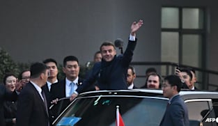 Screaming students give French president rockstar greeting in China