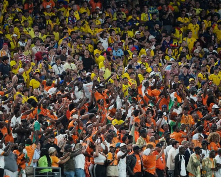 Priced out of tickets to watch their teams at the World Cup, fans opt for cheaper matches