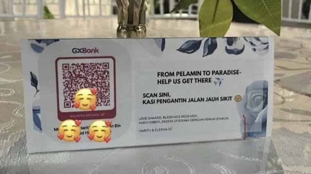 马国婚宴摆二维码收“蜜月费” 宾客：好像在讨乞