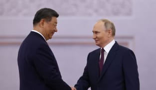 At Kremlin talks, Putin and Xi cast themselves as defenders of world order