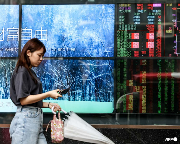 Most stocks rise as Fed hikes and indicates drive to curb inflation