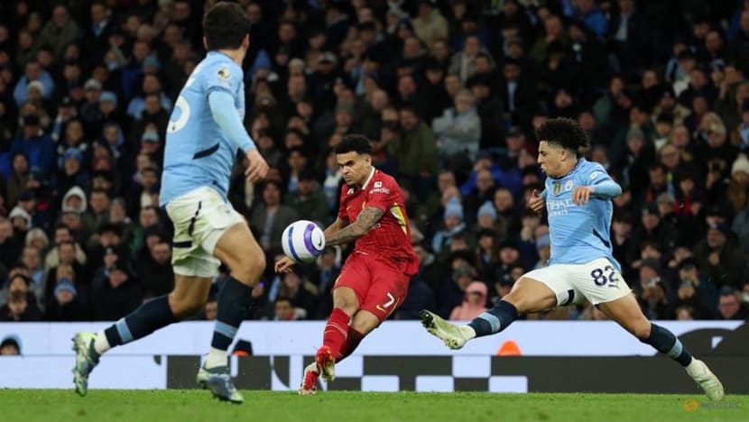 Liverpool beat Man City 2-0 to extend lead at the top to 11 points Liverpool beat Man City 2-0 to extend lead at the top to 11 points