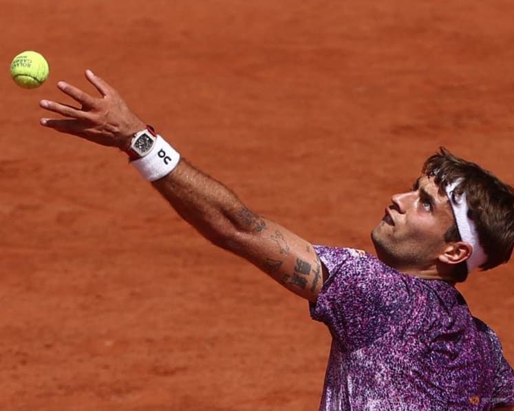 Cobolli cruises past Tien in straight sets to snap American's winning run