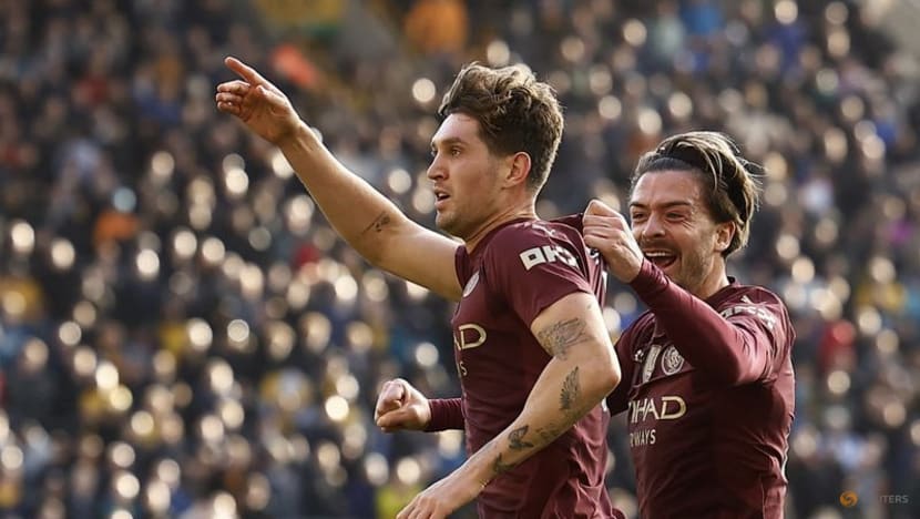 Stones late show earns Man City win at Wolves