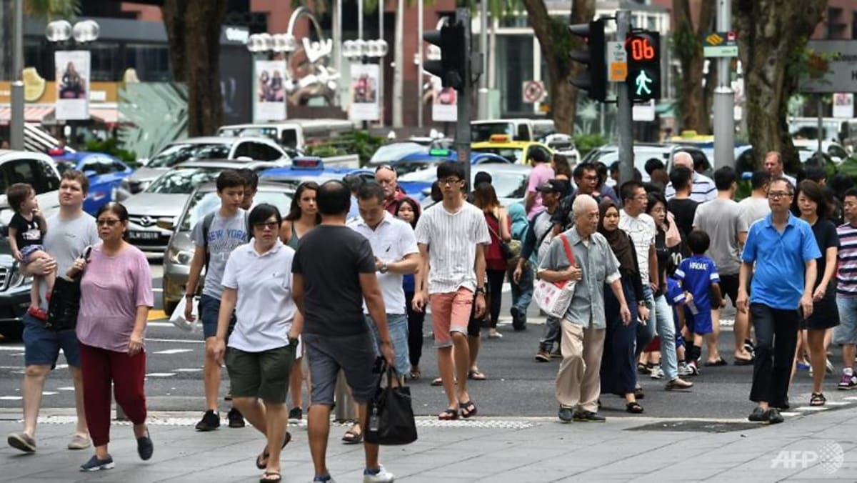 Distracted walking': Should it be made illegal? - CNA