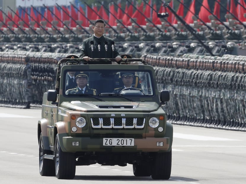 Chinese President Xi Jinping inspects the Chinese troops of People's Liberation Army (PLA) Hong Kong Garrison at the Shek Kong Barracks in Hong Kong, Friday, June 30, 2017. Photo: AP