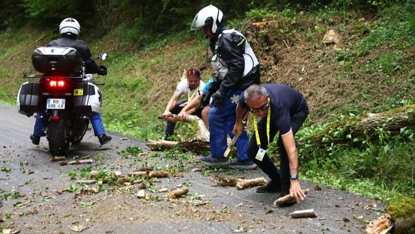 Tour de France final stage neutralised after slippery road conditions