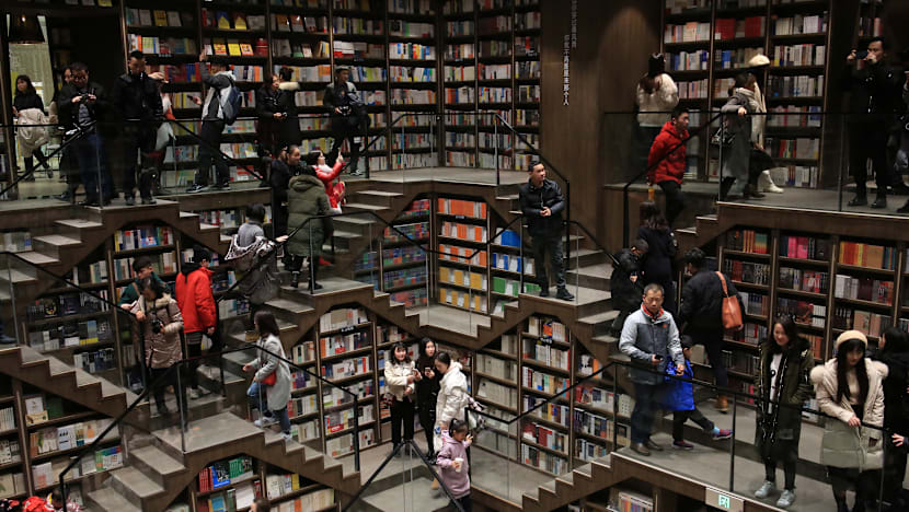 Commentary: In an age of doom scrolling, Asia's book market is thriving -  CNA